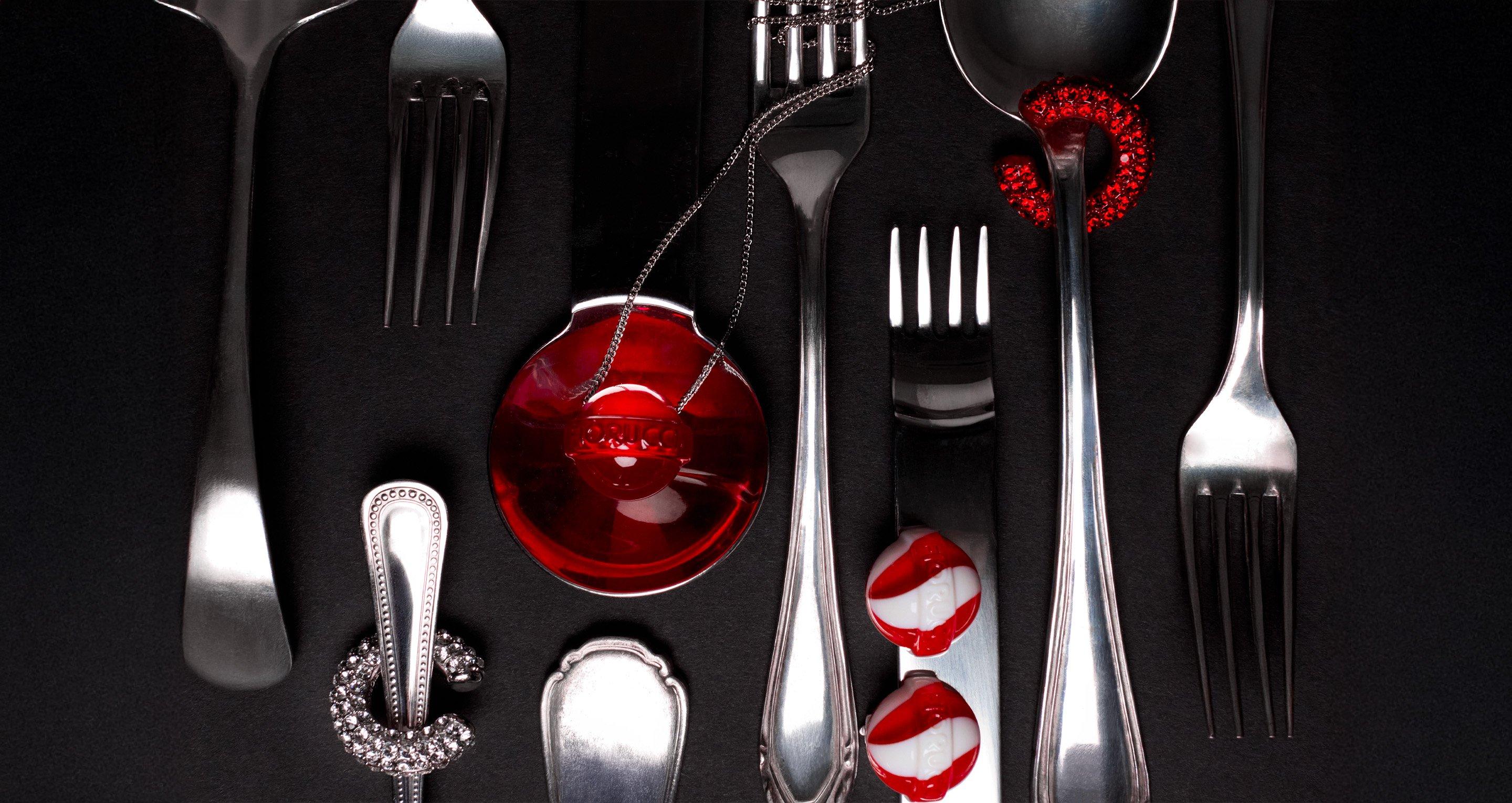 The picture features the Mini Lollipop Earrings in Multi color, the Crystal Ear Cuff in Silver, the Crystal Ear Cuff in Red and the Lollipop Necklace in Red.